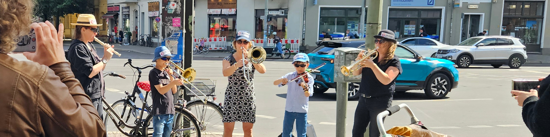 Banner Musike Berlin - Straßenmusik